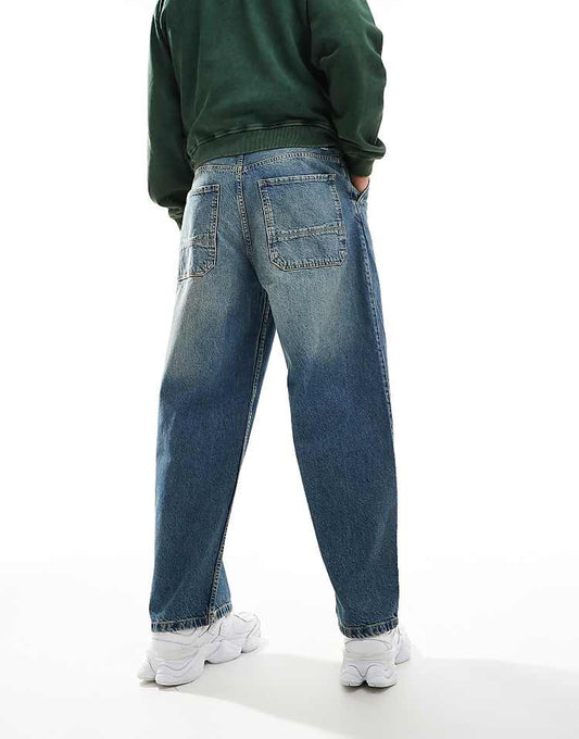 Pull&bear skater fit jean in blue with yellow cast