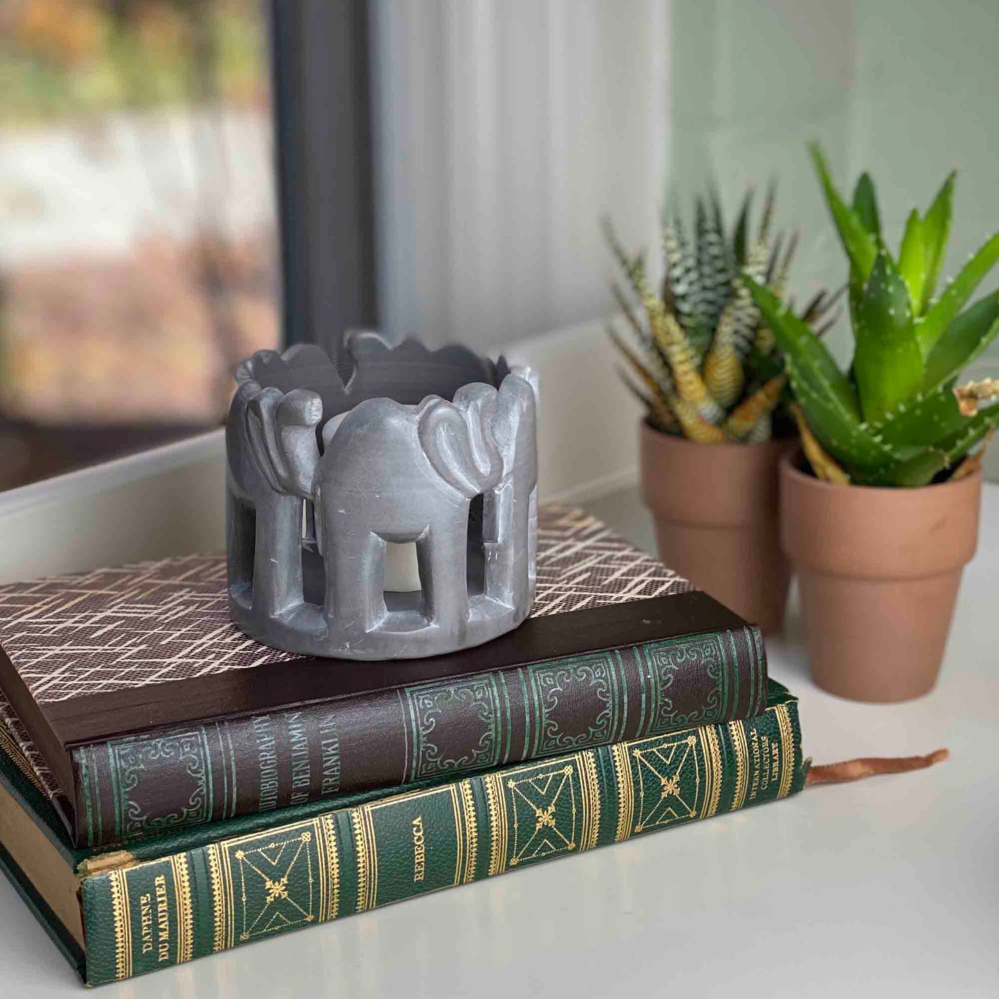 CIRCLE OF ELEPHANTS SOAPSTONE SCULPTURE, 3 TO 3.5-INCH - DARK STONE