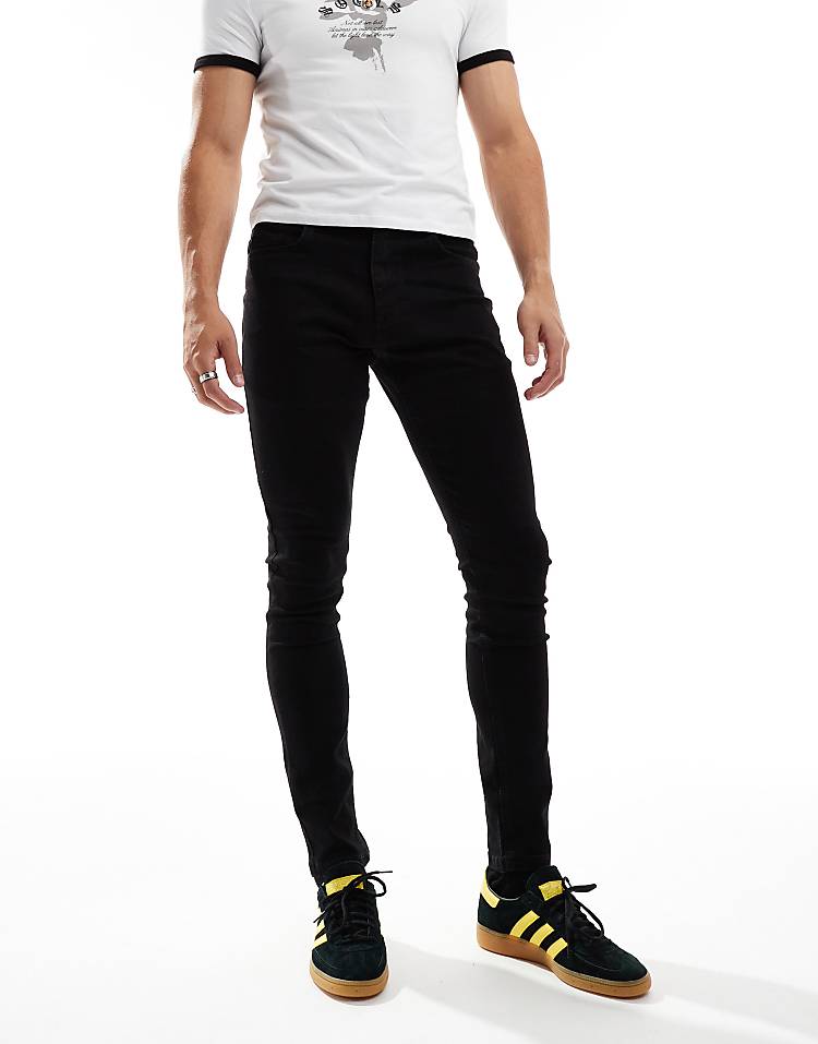 COLLUSION mid rise skinny jeans in washed black