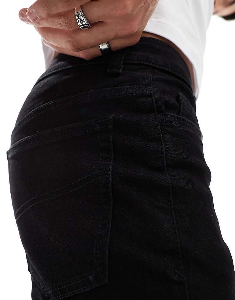 COLLUSION mid rise skinny jeans in washed black