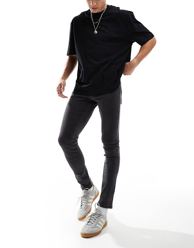 COLLUSION mid rise skinny jeans in washed black