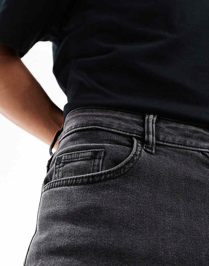 COLLUSION mid rise skinny jeans in washed black