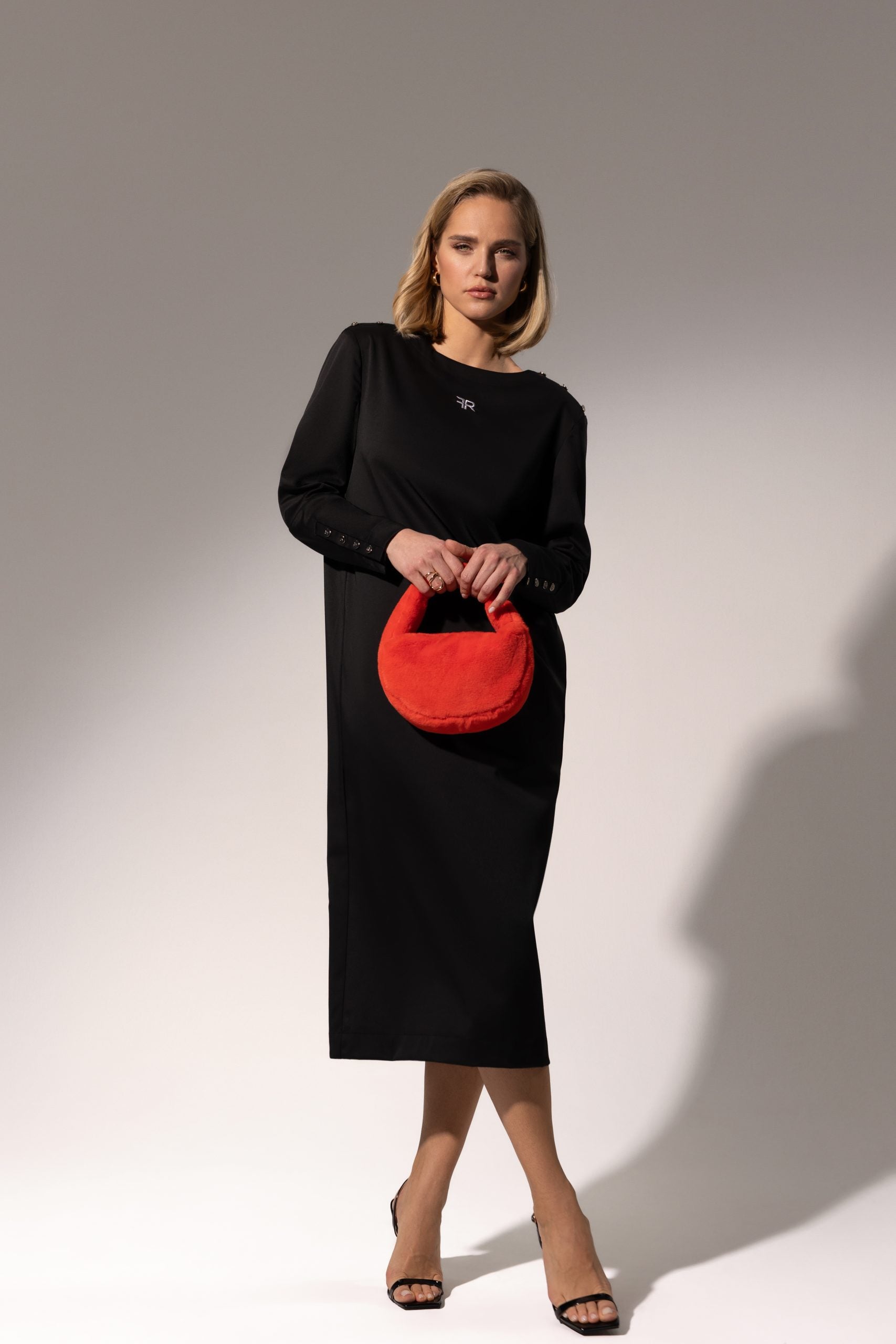 Indulge in the epitome of sophistication with our Elegant Open-Back Dress