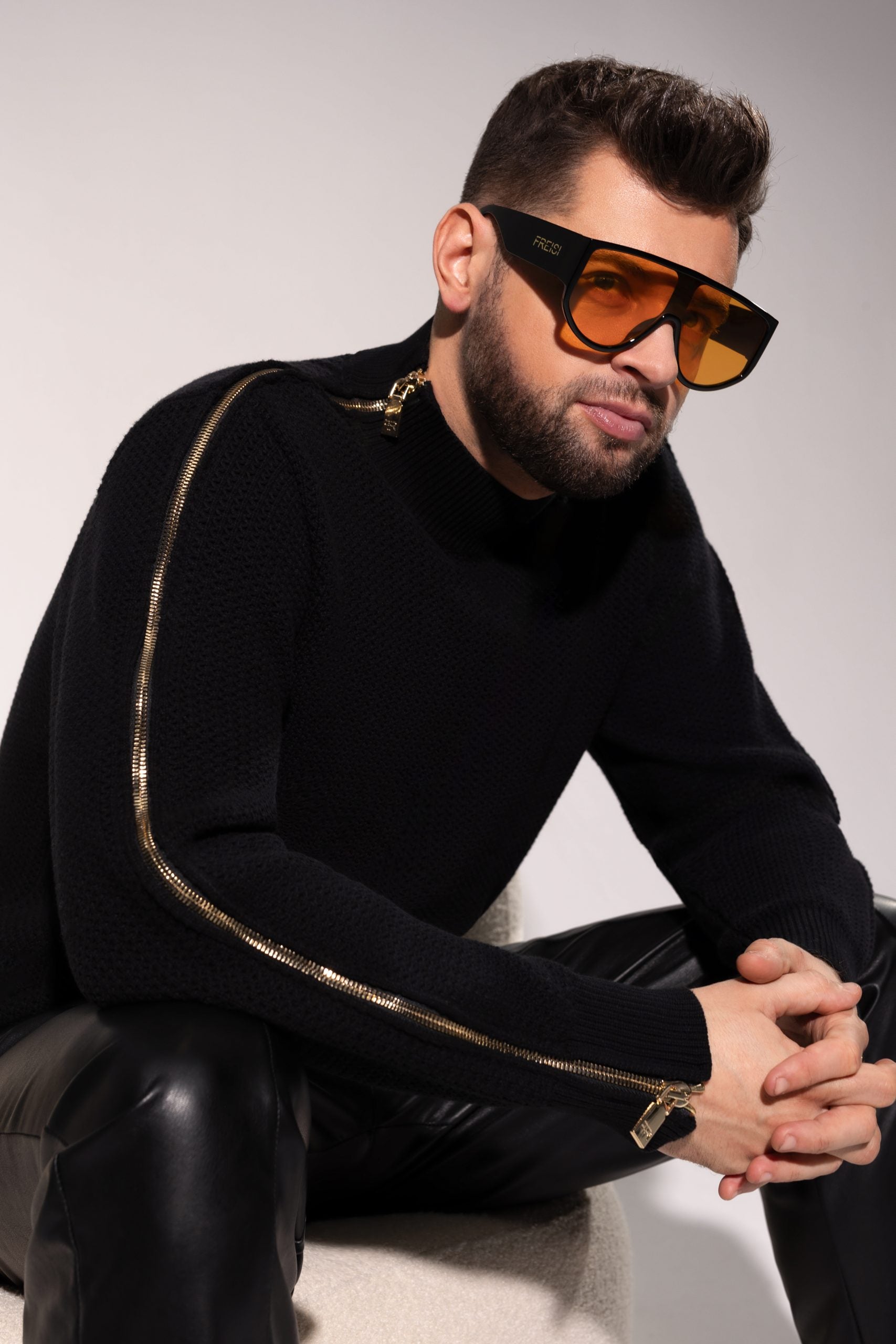 Immerse yourself in the breathable luxury of Freisi Zipped Turtleneck Sweater