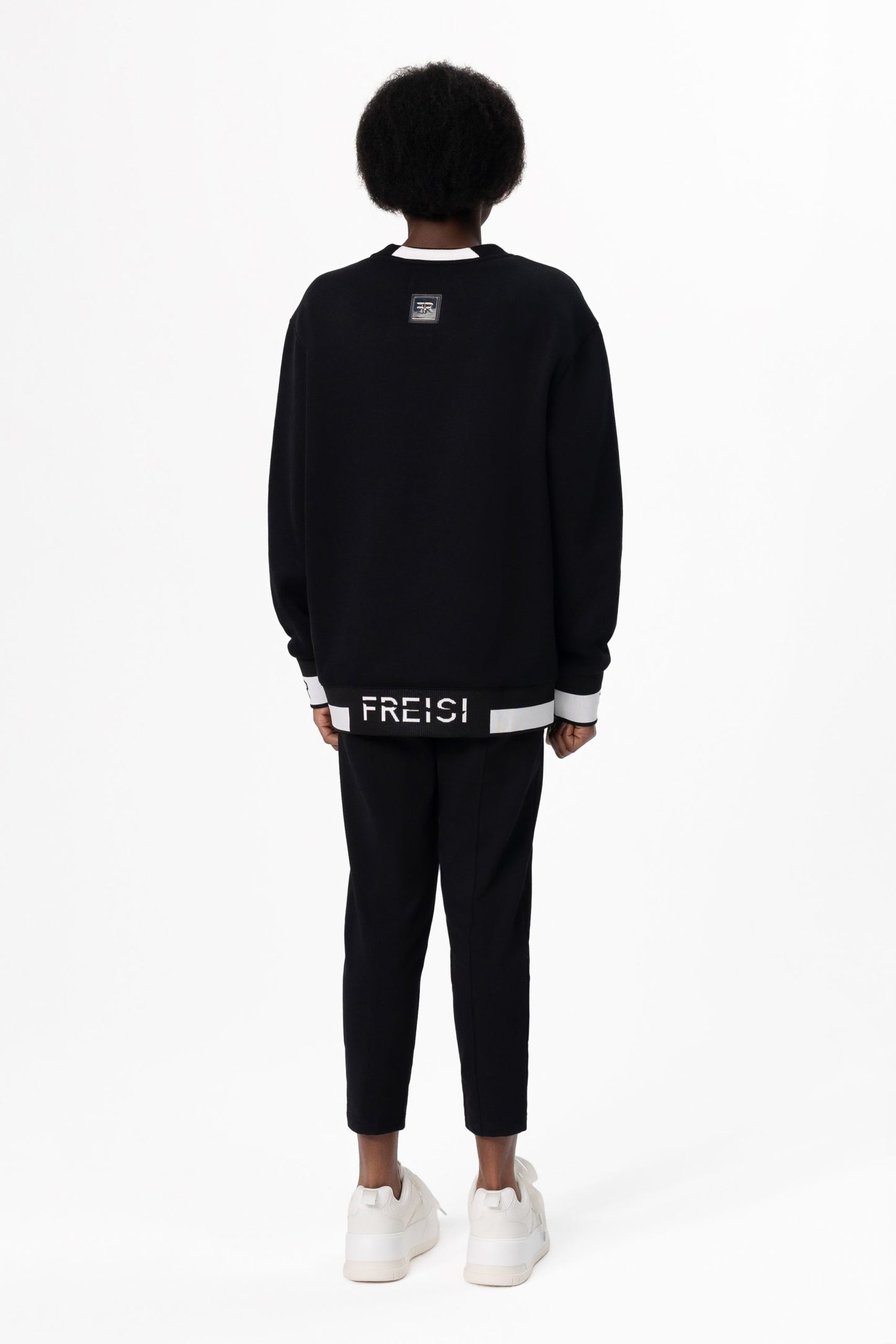 Crystal-Encrusted Unisex Sweatshirt with the crystal-encrusted face silhouette on the front is a nod to motifs from the Freisi paintings collection