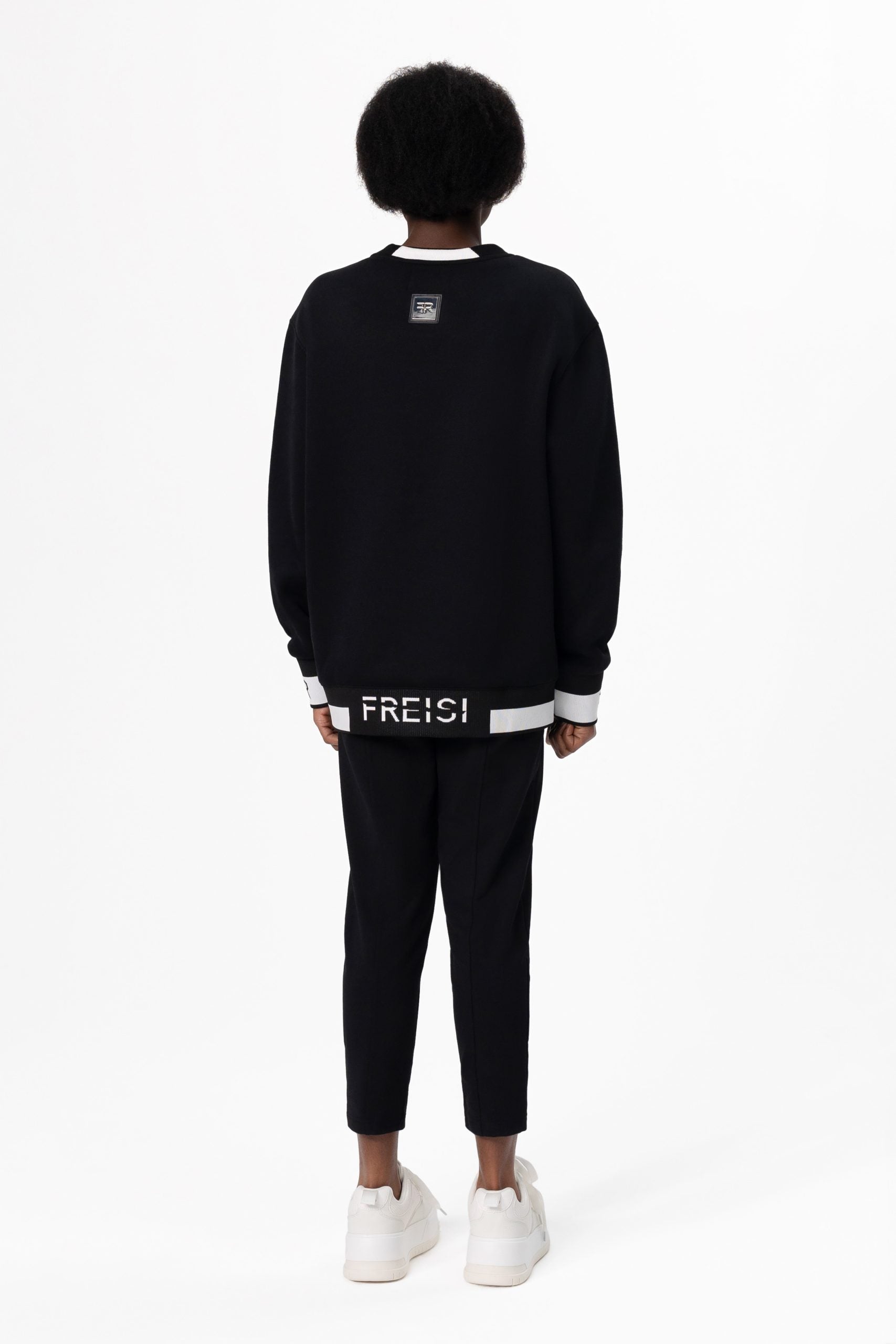 Crystal-Encrusted Unisex Sweatshirt with the crystal-encrusted face silhouette on the front is a nod to motifs from the Freisi paintings collection
