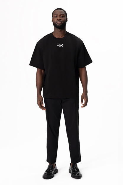 A branded gold metal and leather label on the reverse