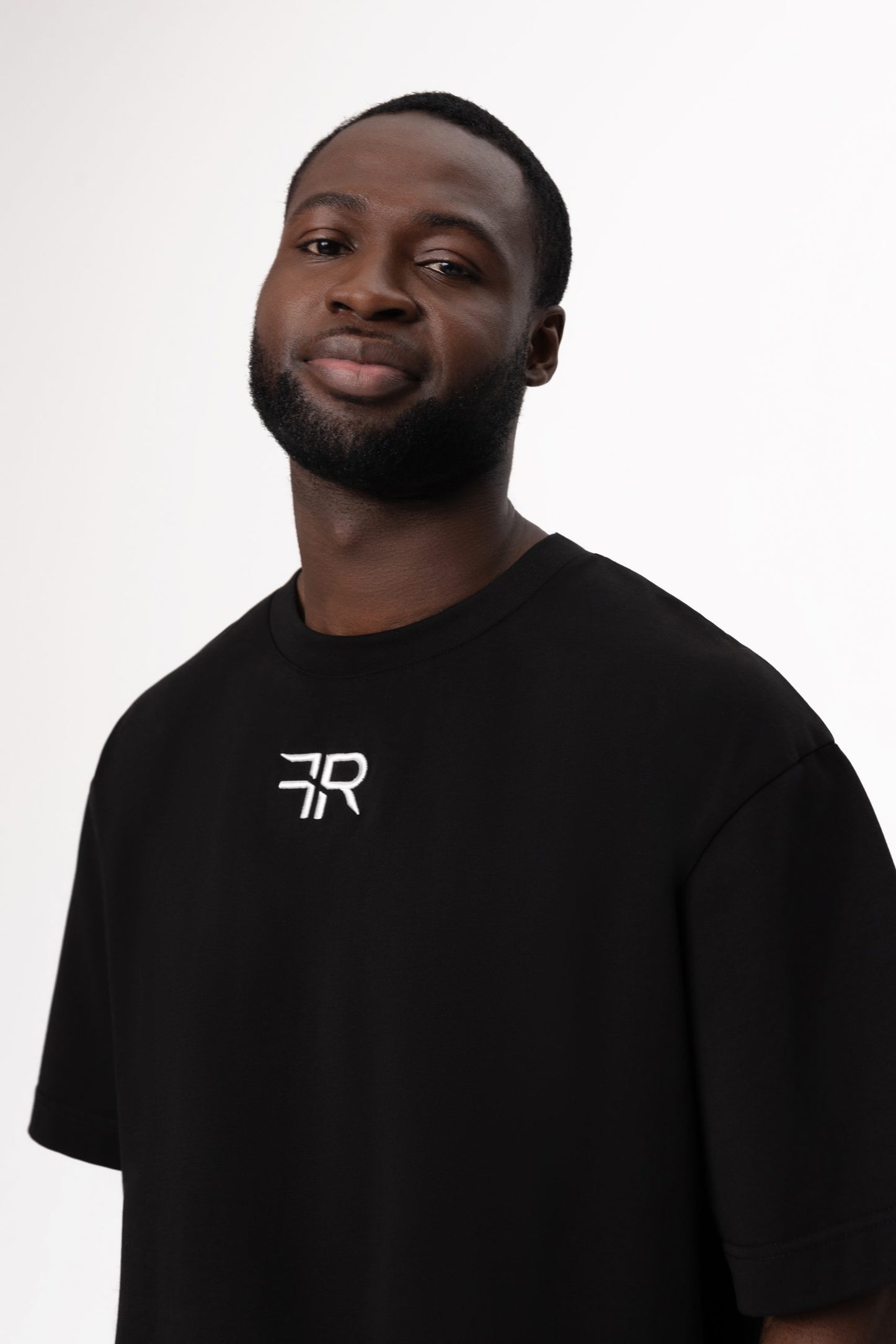 A branded gold metal and leather label on the reverse