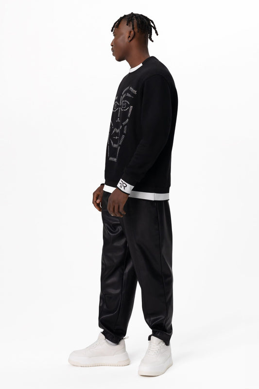 Crystal-Encrusted Unisex Sweatshirt with the crystal-encrusted face silhouette on the front is a nod to motifs from the Freisi paintings collection