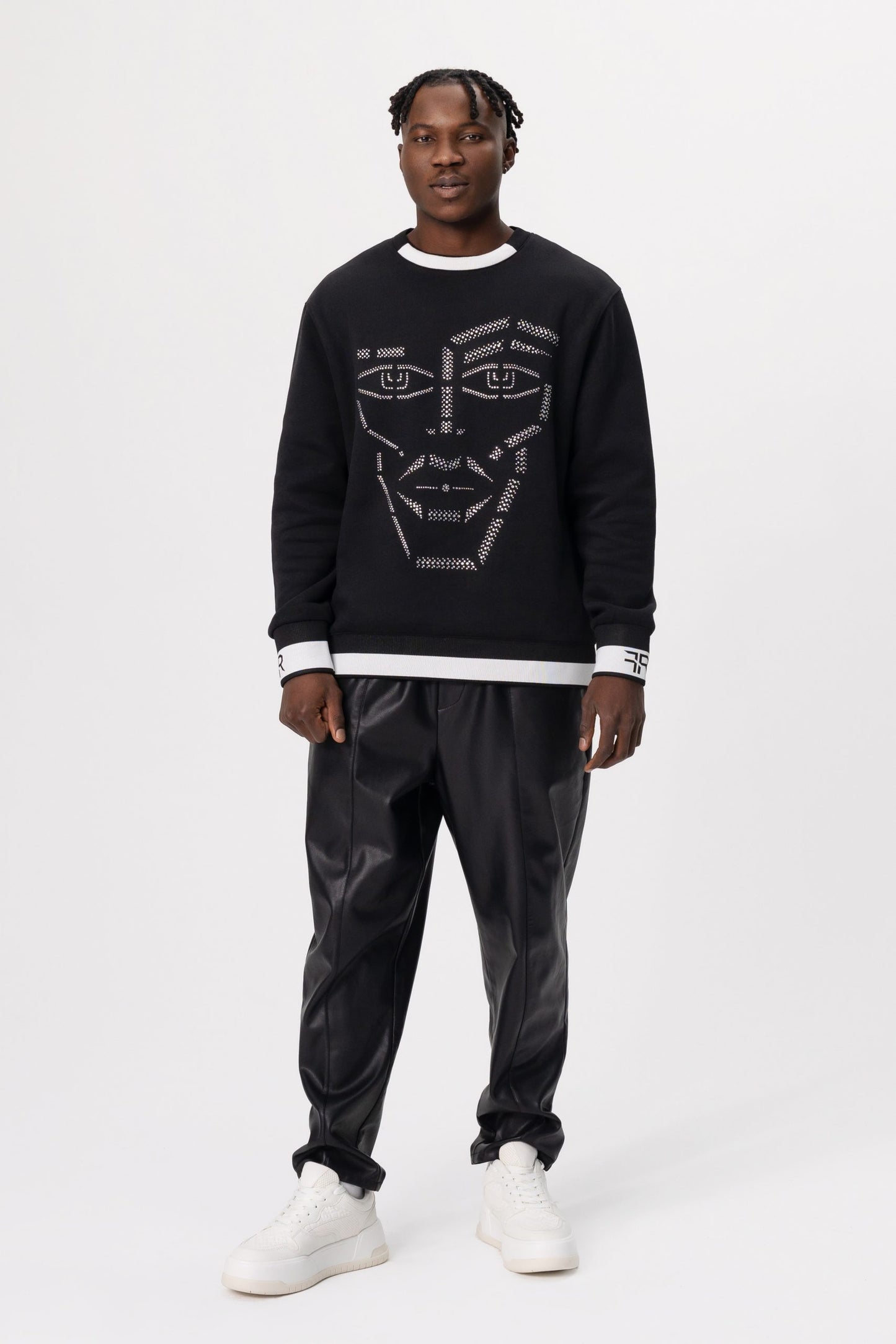 Crystal-Encrusted Unisex Sweatshirt with the crystal-encrusted face silhouette on the front is a nod to motifs from the Freisi paintings collection