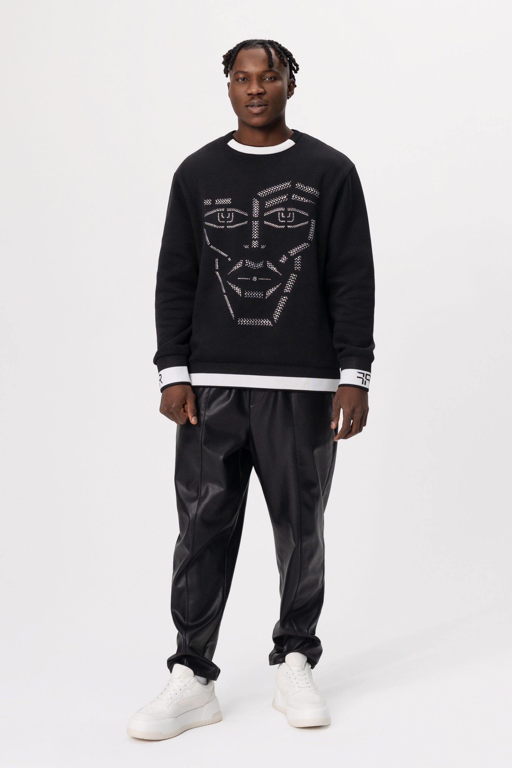 Crystal-Encrusted Unisex Sweatshirt with the crystal-encrusted face silhouette on the front is a nod to motifs from the Freisi paintings collection