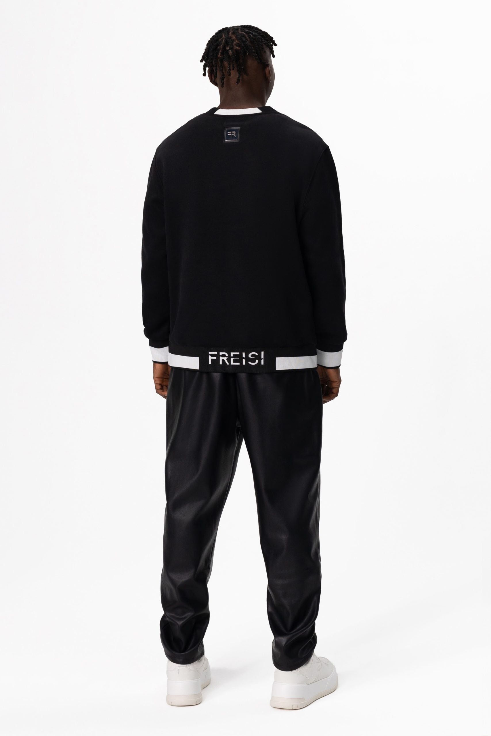 Crystal-Encrusted Unisex Sweatshirt with the crystal-encrusted face silhouette on the front is a nod to motifs from the Freisi paintings collection